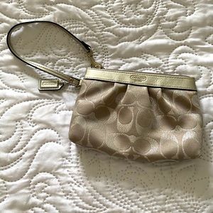Coach metallic wristlet